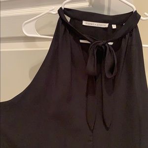Black sleeveless blouse